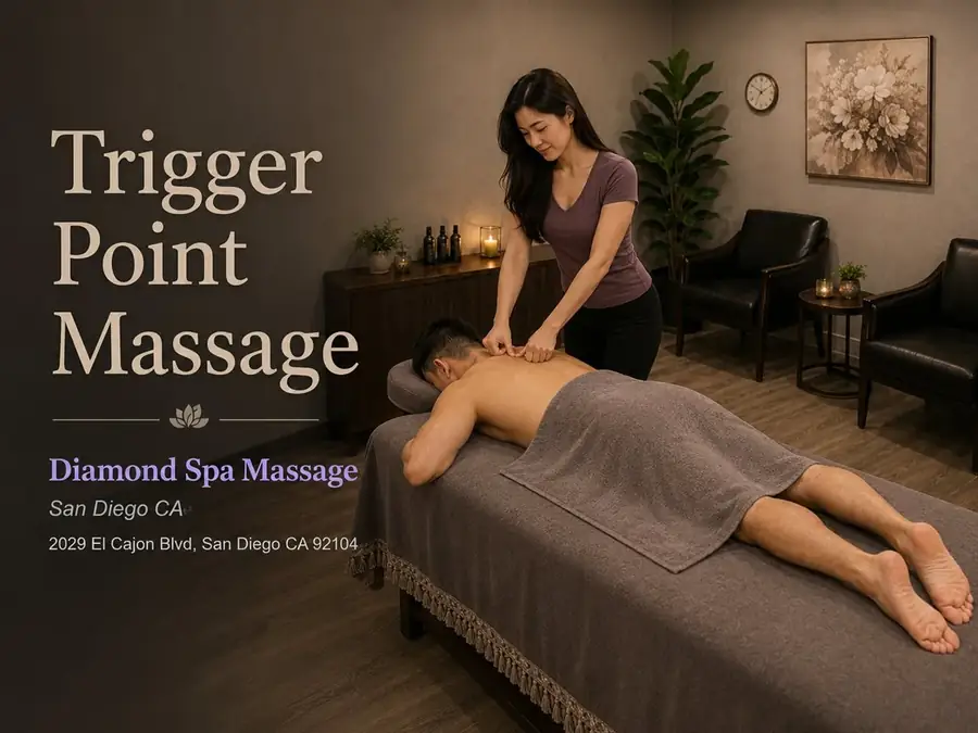 Trigger point massage pressing into a tight knot in the back at Diamond Spa Massage in San Diego CA